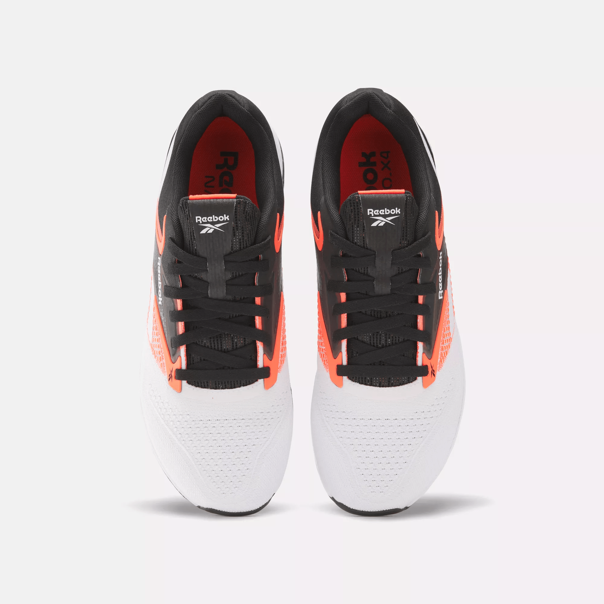 REEBOK | Nano X4 Black/White/Orange Flare